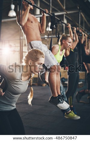 Similar – Image, Stock Photo Muscular man doing chin-ups