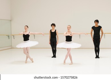 A group of young male and female ballet dancers practicing - Powered by Shutterstock