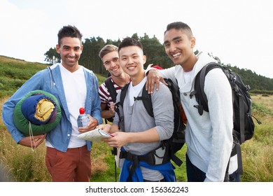 Group Of Young Men On Camping Trip In Countryside - Powered by Shutterstock