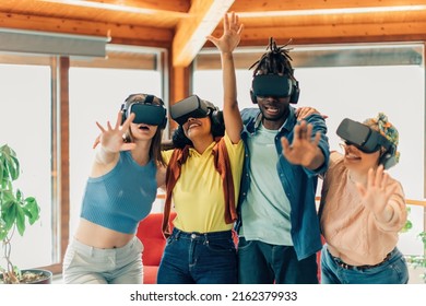 group of young multiethnic astonished friends having fun using 3d glasses - Powered by Shutterstock