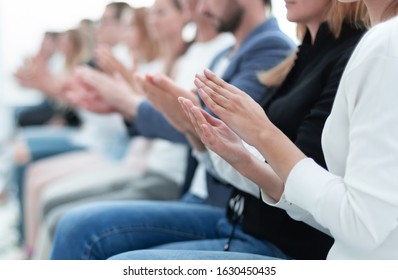 group of young people applauding sitting in the conference room. - Shutterstock ID 1630450435