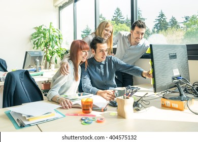 Group of young people employee workers with computer in urban alternative studio - Business concept of human resource and fun on working time - Start up entrepreneurs at office - Bright vintage filter - Shutterstock ID 404575132