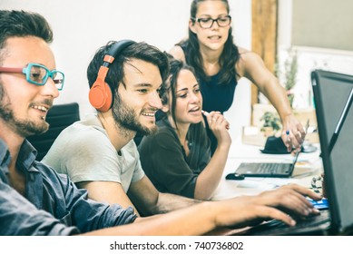 Group Of Young People Employee Workers With Computer In Startup Studio - Human Resource Business And Teamwork Concept On Laptop Working Time - Start Up Entrepreneurs At Office - Teal And Orange Filter