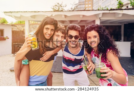 Similar – Group of young people having fun in summer party