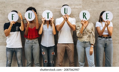 Group of young people hiding their face with the world Future - what prospects for new generations?- Concept of youth wondering about his future. - Shutterstock ID 2087062987
