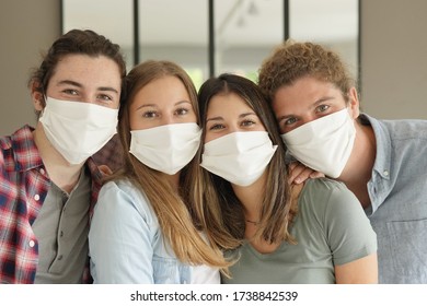 A Group Of Young People With Masks