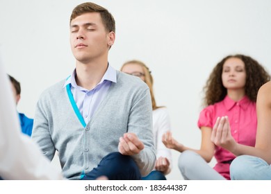 Group Young People Meditating Office Desk Stock Photo 183644387 ...