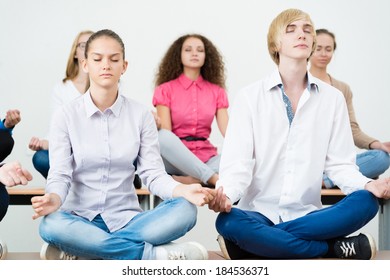 Group Young People Meditating Office Desk Stock Photo 192193616 ...