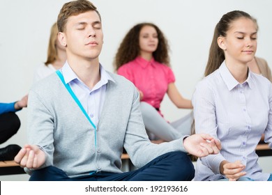 Group Young People Meditating Office Desk Stock Photo 192193616 