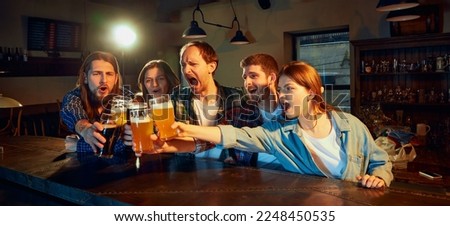 Similar – Image, Stock Photo Young business people on the roof terrace at the Afterwork Beer