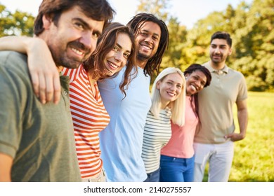 Group of young people as a multicultural community at a team event in summer - Shutterstock ID 2140275557