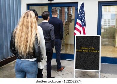 Group Of Young People Standing At The Entrance Of US Embassy - Shutterstock ID 1522522574