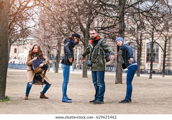 Group Young People Standing Funny Poses Stock Photo Edit Now