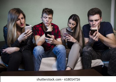 Group Of Young People Staring At Smartphone, Being Antisocial, Smartphone Addiction 