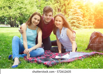 Man with 2 women