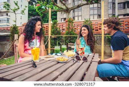 Group of people having fun in a summer day