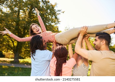 Group Of Young People As A Team During A Trust And Team Building Exercise