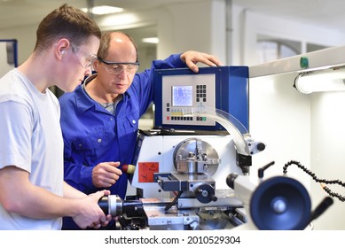 Group of young people in technical vocational training with teacher  - Powered by Shutterstock