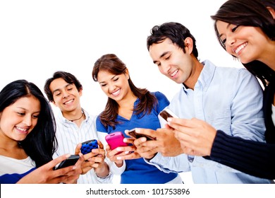 Group of young people texting on their cell phones - isolated over white