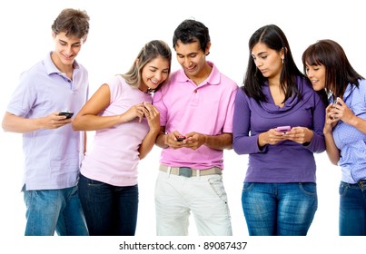 Group Of Young People Texting On Their Cell Phones - Isolated Over A White Background