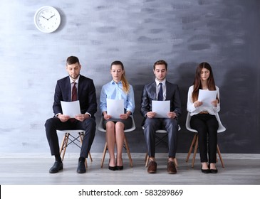 Group Of Young People Waiting For Interview Indoors