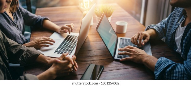 Group of young people working together. Creative business people in modern office. Hipster team in coworking. Young modern colleagues. Teamwork. Startup concept - Shutterstock ID 1801254082