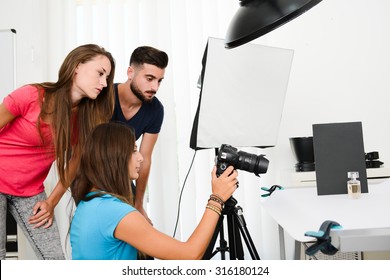 group of young photographer student on photography shooting workshop course indoor in a photo studio - Powered by Shutterstock