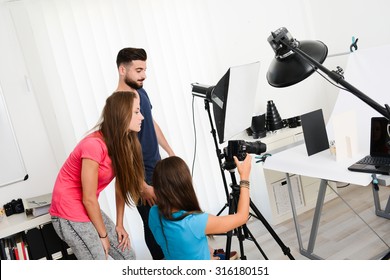 group of young photographer student on photography shooting workshop course indoor in a photo studio - Powered by Shutterstock