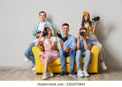 Group of young photographers during classes in studio