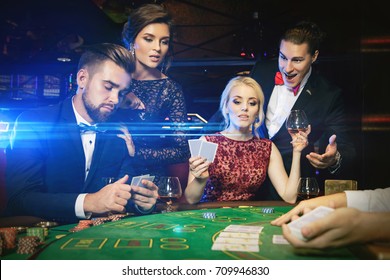 Group Young Rich People Playing Poker Stock Photo (Edit Now) 709946803
