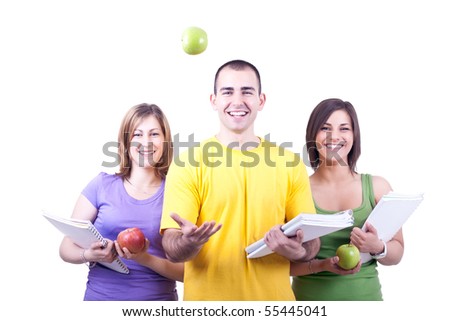 group of young students with notebooks and apples