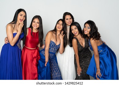 A Group Of Young Teen Girls In Dresses Going To A Prom Dance