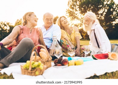 Group Of Youthful Seniors Having Fun Outdoors - Four Pensioners Bonding Outdoors, Concepts About Lifestyle And Elderly