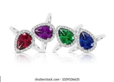 Grouping Of Color Gemstone Rings With Colored Diamonds And Gemstones On White Background 
