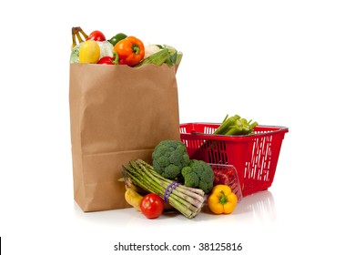 A grouping of fresh produce including fruits and vegetables in a grocery bag or sack with copy space - Shutterstock ID 38125816