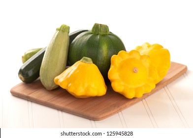 Grouping Of Summer Squash On White Background