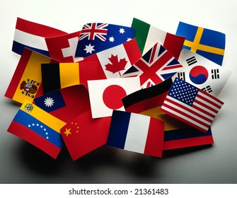 Grouping of various flags of the world on white