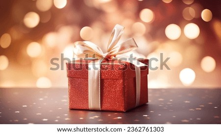 Groups of Christmas presents and balls against the backdrop of a festive Christmas tree with colored festive lights