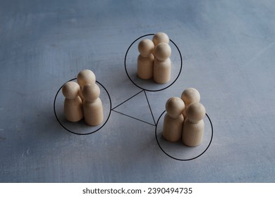 Groups of people are connected by lines. Interacting and joining forces with other teams. Interdependence correlation in workflow. 