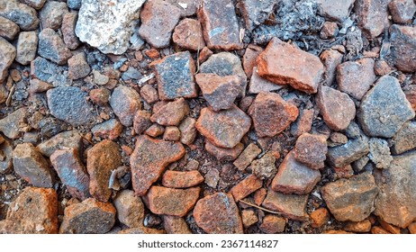 groups of small roof tile fragments on the ground - Shutterstock ID 2367114827