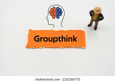 Groupthink.The word is written on a slip of colored paper. Psychological terms, psychologic words, Spiritual terminology. psychiatric research. Mental Health Buzzwords.