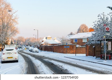 Grove Park, Lewisham, London, UK - February 28, 2018: Cars Parked On A Snowy Road In South East London In Winter