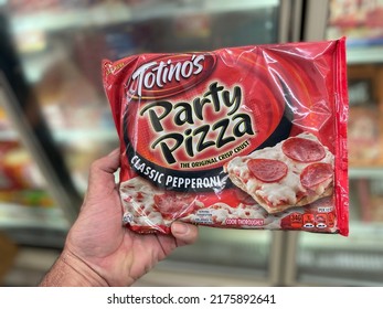 Grovetown, Ga USA - 06 21 22: Retail Store Hand Holding Totinos Pizza