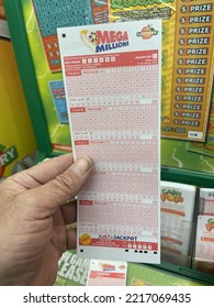 Grovetown, Ga USA - 09 07 22: Retail Grocery Store Georgia Lottery Hand Holding Play Slip