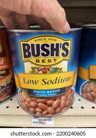 Grovetown, Ga USA - 09 09 22: Retail Grocery Store Hand Holding Bushs Low Sodium Beans