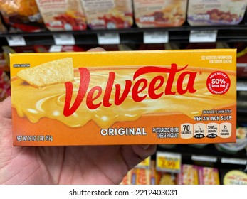 Grovetown, Ga USA - 09 24 22: Grocery Store Hand Holding Velveeta Cheese Block