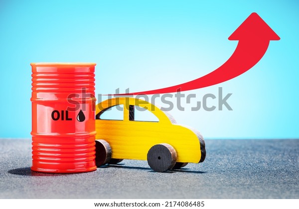 Grow of fuel prices.  Yellow auto, red oil\
barrel with chart increase of fuel\
price.