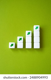 Growing graph made of blocks and up arrows. Steps of growth. Enlargement and growth concept. Career, economics. Statistics and news. Skills and self-development.