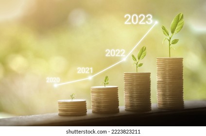 Growing growth year 2020 to 2023. Business graph with arrow up. Growing money coins stack. Saving money investment. - Shutterstock ID 2223823211