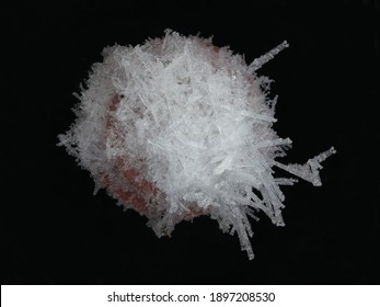 Growing Ice Crystals Are Unique In Their Shape On A Black Background